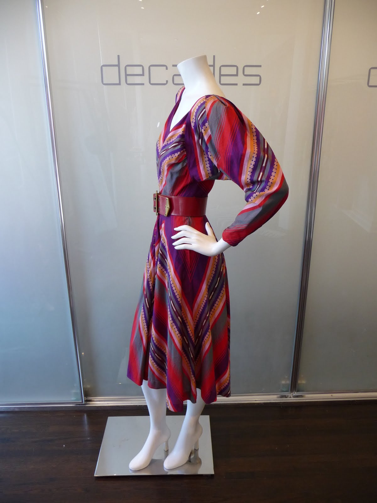 CLAIRE MCCARDELL fashion designs, belted bias-cut dress with multiple side bust pleats