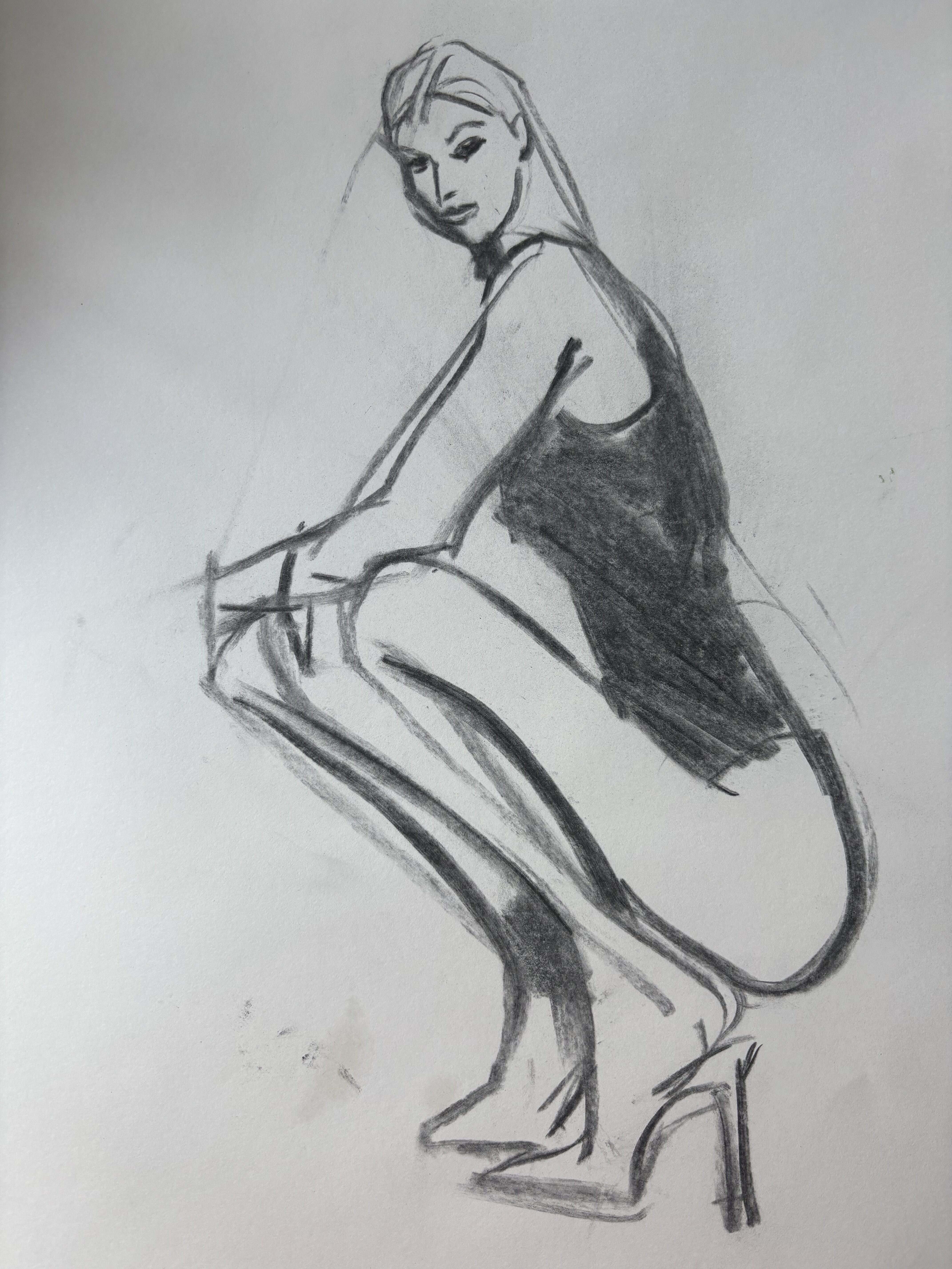 Fashion Model drawing study with vine charcoal, crouching model in heels and leotard